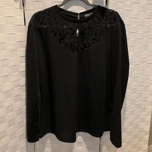 Long sleeved top with laser cut detail neckline
